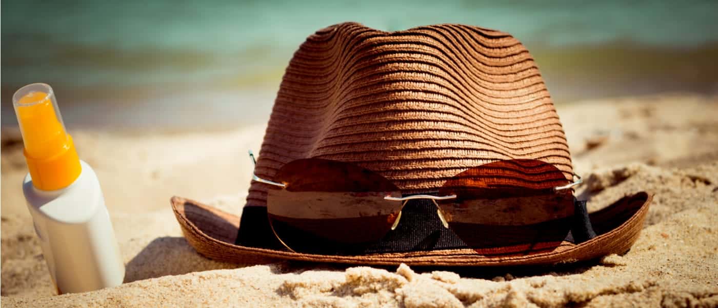 Hat, sunglasses and sun cream