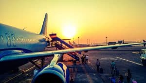 Travellers getting on a plane