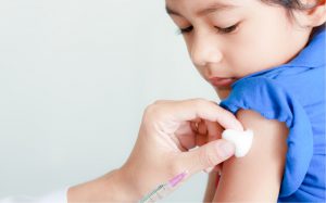Child vaccination which could be chicken pox, MMR and Meningitis ACWY and B vaccines for children