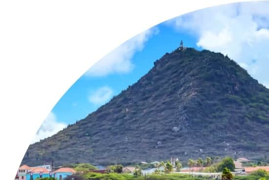 Mountain covered in trees in Aruba