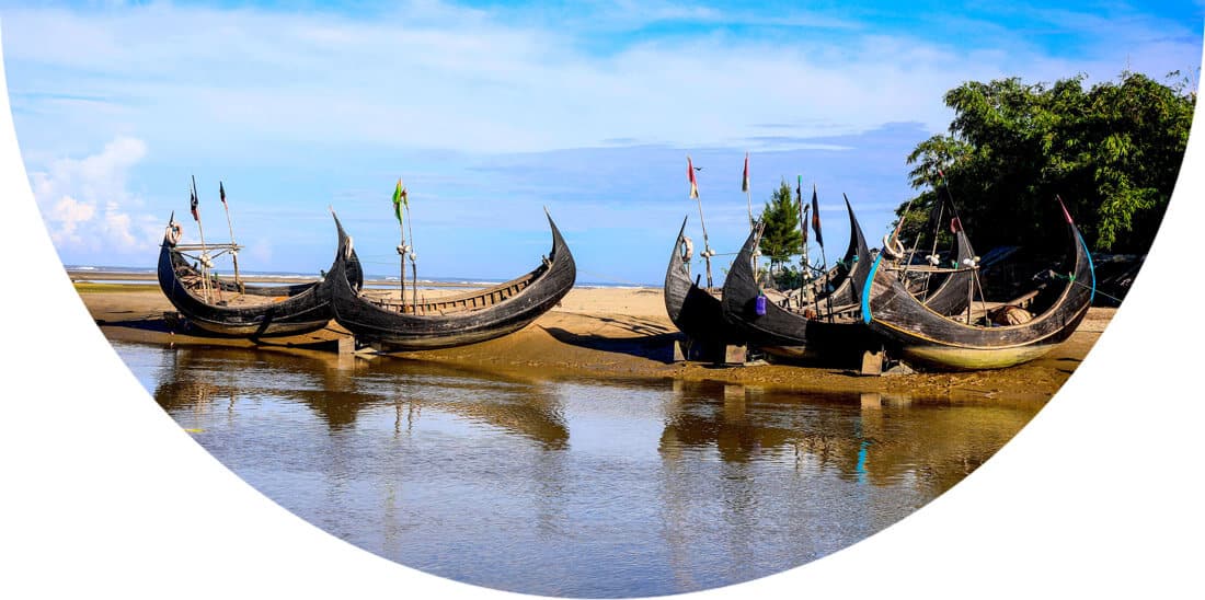 Boats on the shore of a river in Bangladesh