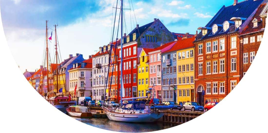 Boats and buildings of Nyhavn pier in the Old Town of Copenhagen, Denmark