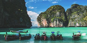 Boats in Maya Bay, Ko Phi Phi Le Island, Krabi Province of Thailand